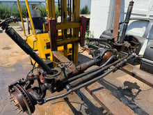 Load image into Gallery viewer, 94-02 dodge ram complete dana 44 front axle with 3.55 gears ( ROT FREE)
