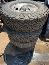 Load image into Gallery viewer, 94-01 dodge ram 5 lug alloy wheels and tires
